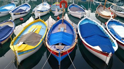 High angle view of boats moored in water 