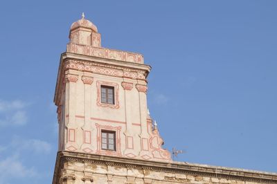 Low angle view of cathedral against blue sky