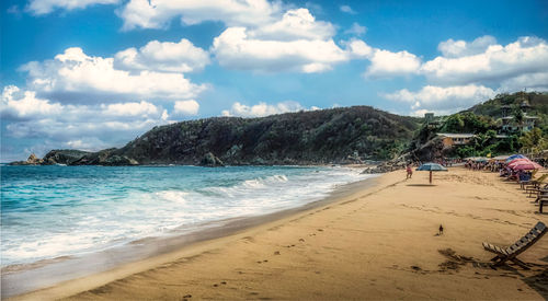 Scenic view of beach against sky