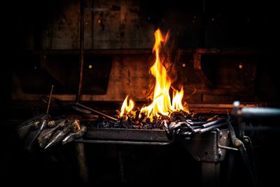 Fire burning in furnace at blacksmith's