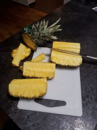 High angle view of chopped bread on cutting board