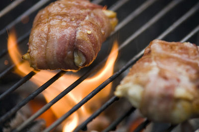 Close-up of meat on barbecue grill