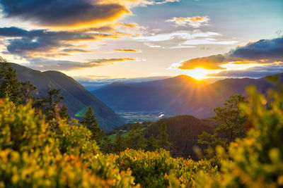 Scenic view of mountains against sky during sunset