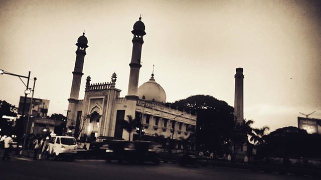 architecture, built structure, building exterior, dome, sky, low angle view, place of worship, city, religion, street light, clear sky, spirituality, travel destinations, famous place, church, travel, outdoors, history, architectural column