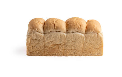 Close-up of bread against white background