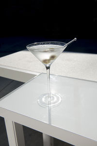 Close-up of wine glass on table