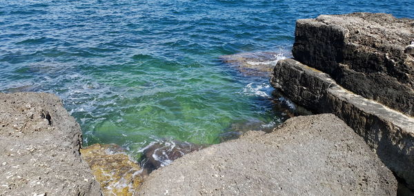 High angle view of rocks on beach