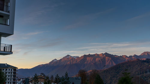 Scenic view of mountains against sky during sunset