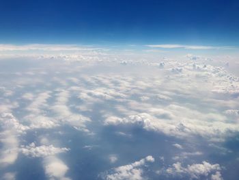 Aerial view of clouds over blue sky