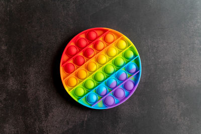 High angle view of multi colored candies on table