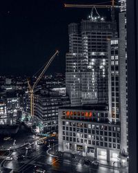 Illuminated buildings in city at night