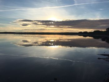 Scenic view of sunset over river
