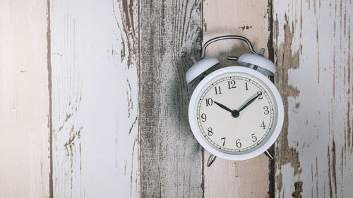 Close-up of clock on wall