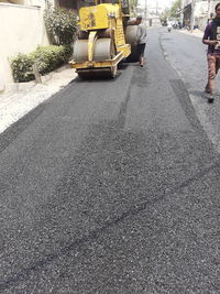 People on road in city