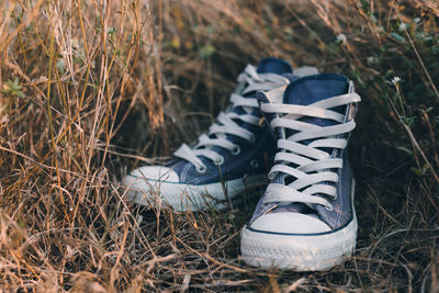 High angle view of shoes on field