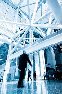 People walking in modern office building