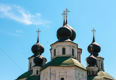 Low angle view of cathedral and building against sky