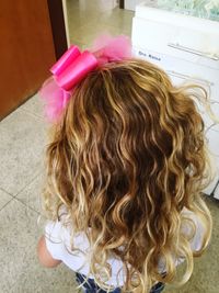 Rear view of girl with eyes closed