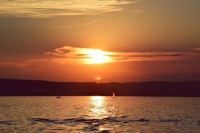 Scenic view of sea against sky during sunset