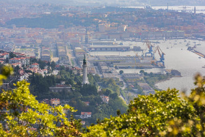 High angle view of townscape and trees in city