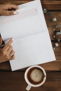 High angle view of coffee cup on table