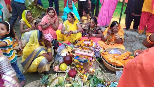 High angle view of people sitting at market