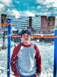 Portrait of boy standing in winter