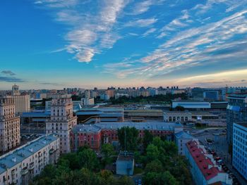 High angle view of buildings against sky at sunset