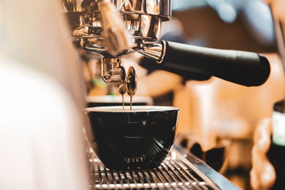 Close-up of coffee cup on table in cafe