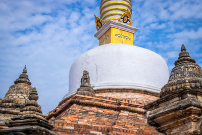 Low angle view of temple building against sky