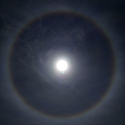 Low angle view of moon against sky at night