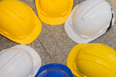 High angle view of yellow hat on table