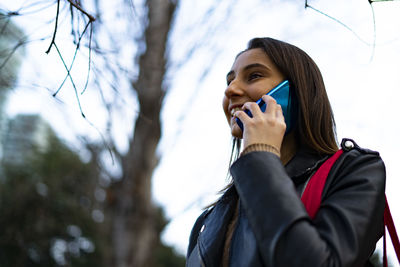 Lesbian woman talking on the phone.