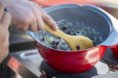 Midsection of man preparing food