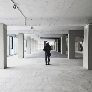 Full length of woman walking on wall