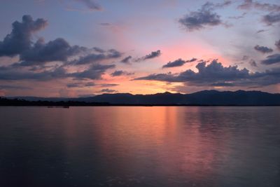 Scenic view of lake against sky during sunset