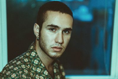 Portrait of young man looking away