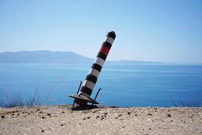 Scenic view of sea against blue sky