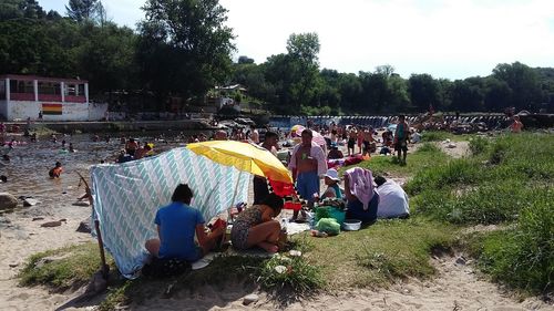 People at town square against sky