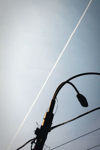 Low angle view of rainbow in sky