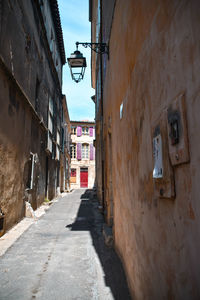 Narrow alley along buildings