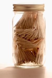 Close-up of glass jar on table