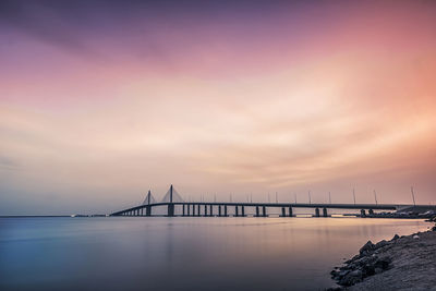 View of suspension bridge over sea