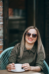 Young beautiful woman with long hair enjoying springtime.