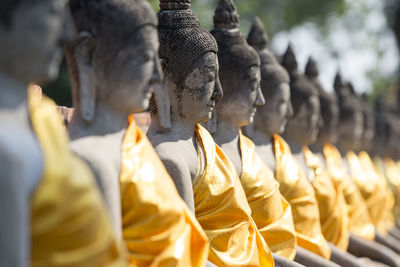 Buddha statues in row at wat yai chai mongkhon