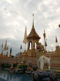 Statue of temple against sky