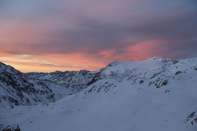 Scenic view of mountains against sky during sunset