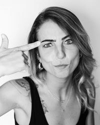 Close-up portrait of a smiling young woman