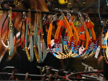 Close-up of bracelets for sale in market