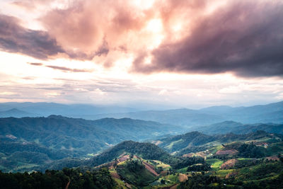 Aerial view of agricultural landscape against sky